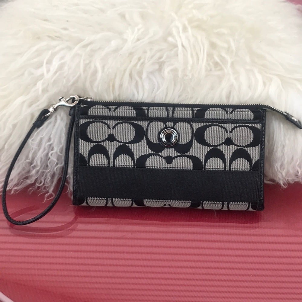 Coach wristlet black with patent leather trim